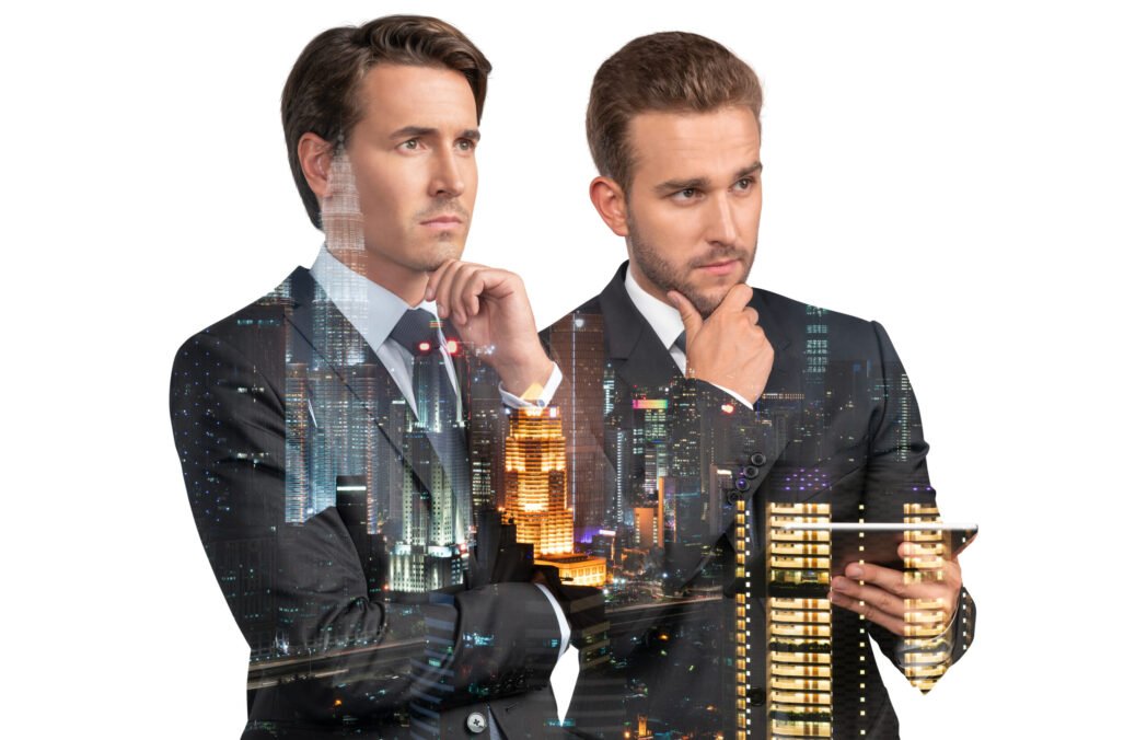 Two handsome businessmen in suits, using tablet device and pensively thinking. Asia corporate lifestyle, communication of diverse young professionals. Night Kuala Lumpur city view. Double exposure