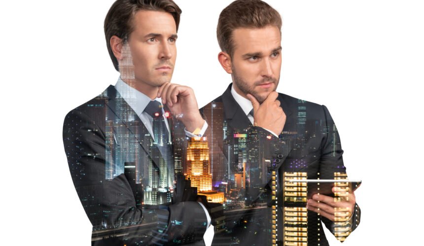 Two handsome businessmen in suits, using tablet device and pensively thinking. Asia corporate lifestyle, communication of diverse young professionals. Night Kuala Lumpur city view. Double exposure